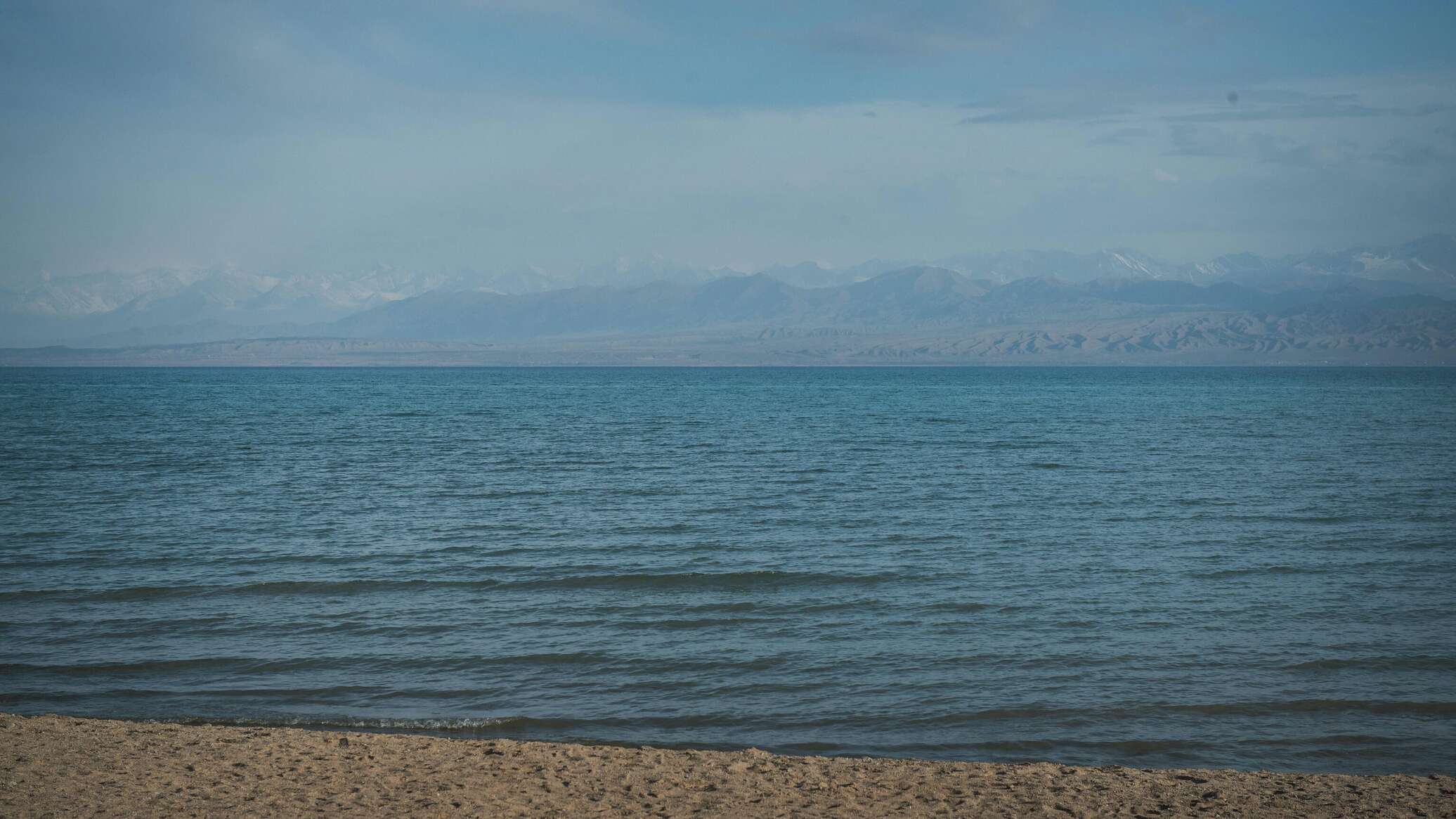 Озеро иссык куль отдых цены 2024. Озеро Иссык-Куль. Озеро Иссык-Куль Киргизия. Киргизия Иссык-Куль Бостери. Птушкин Киргизия Иссык Куль.