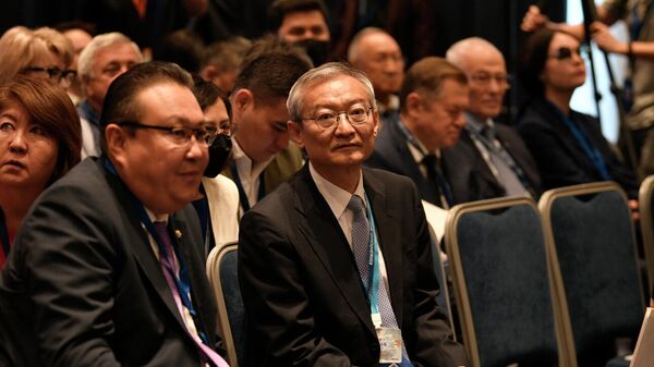 Генеральный секретарь ШОС Чжан Мин (справа) - Sputnik Кыргызстан
