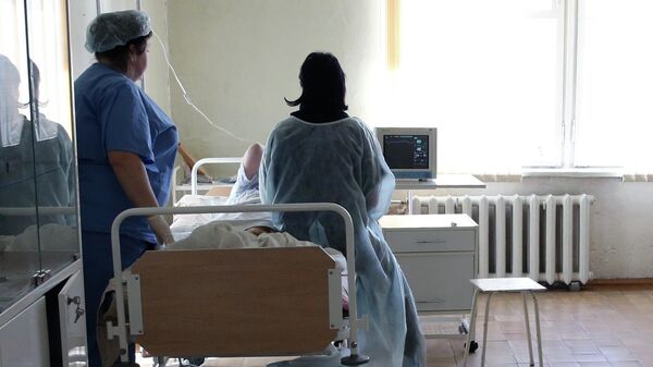 Женщина в палате больницы. Архивное фото - Sputnik Кыргызстан