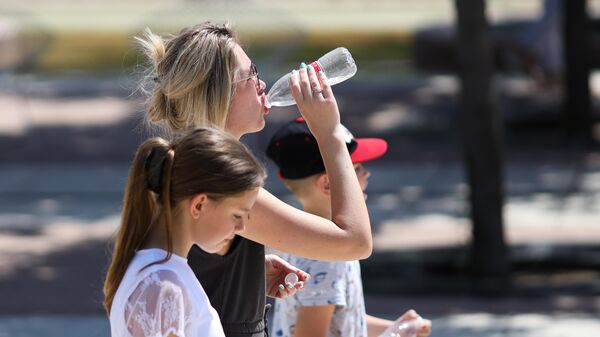 Отдыхающие в парке. Архивное фото - Sputnik Кыргызстан