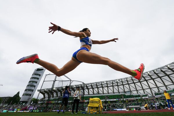 Греческая бегунья Спиридула Кариди во время квалификации в тройном прыжке среди женщин на Чемпионате мира по легкой атлетике в Юджине (США) - Sputnik Кыргызстан