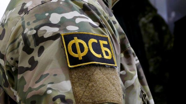 Нашивка на форме сотрудника ФСБ РФ. Архивное фото - Sputnik Кыргызстан