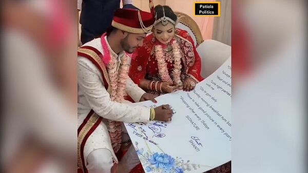 Необычный брачный контракт составили перед свадьбой молодожены в Индии. Видео - Sputnik Кыргызстан