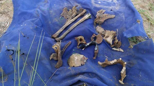 Человеческие останки обнаруженные на озере Иссык-Куль во время поисков тела  четырехлетней девочки - Sputnik Кыргызстан