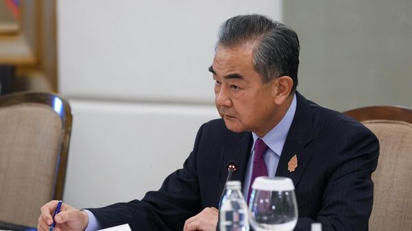 Министр иностранных дел КНР Ван И - Sputnik Кыргызстан