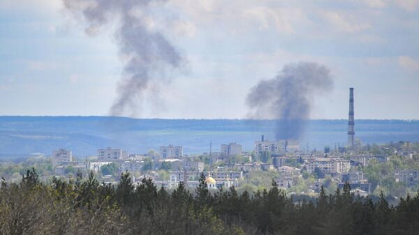Обстрел украинскими войсками города Изюм - Sputnik Кыргызстан