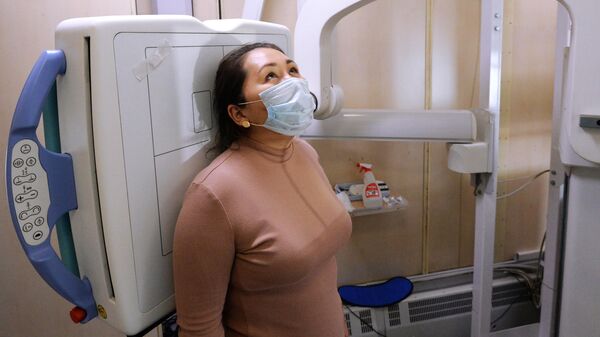 Женщина во время медицинского обследования. Архивное фото - Sputnik Кыргызстан