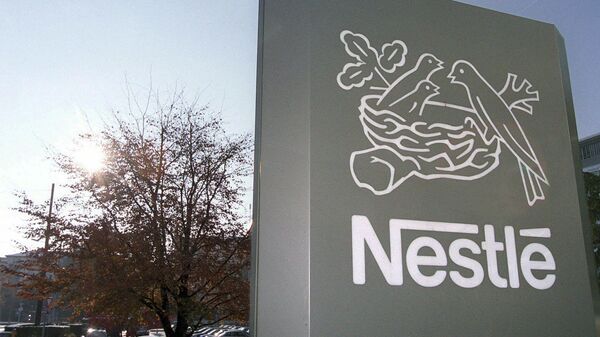 Nestle компаниясынын логотиби. Архив - Sputnik Кыргызстан