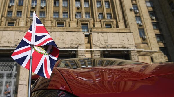 Флаг Великобритании на дипломатическом авто. Архивное фото - Sputnik Кыргызстан