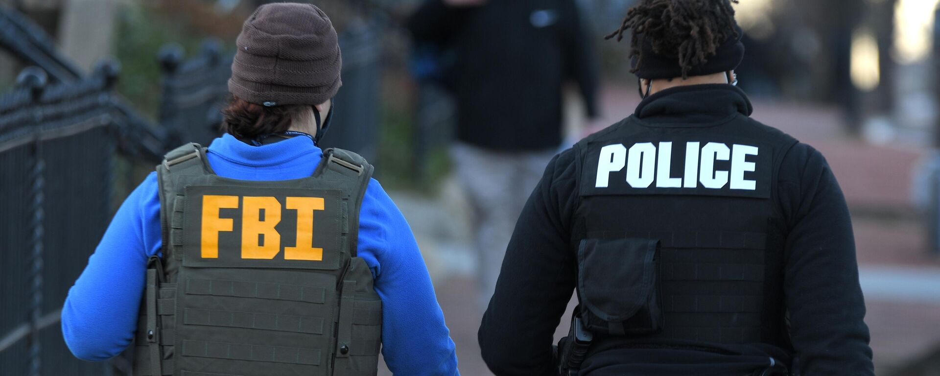 ФБР и полиция США. Иллюстративное фото - Sputnik Кыргызстан, 1920, 14.12.2025