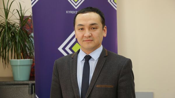 Руководитель группы надзора за обменными бюро НБКР Равшанбек Мурзалиев - Sputnik Кыргызстан