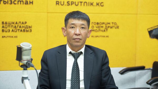 Директор Департамента социальной защиты Министерства труда и социального развития КР Актан Балбаков - Sputnik Кыргызстан