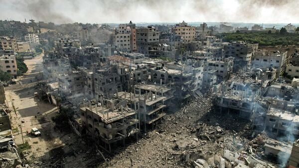 Разрушенные здания в секторе Газа после авиаударов Израиля - Sputnik Кыргызстан