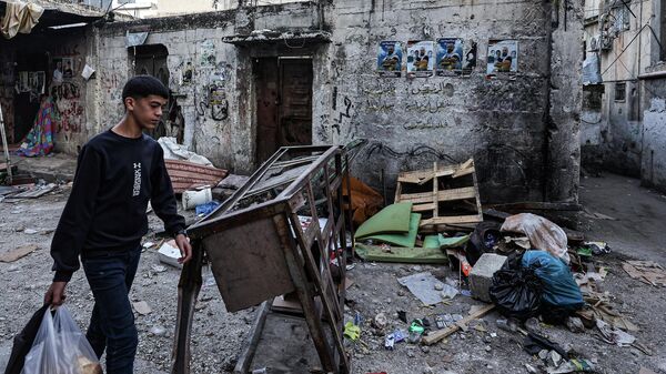 Газа секторунда бара жаткан палестинанын жашоочусу. Архивдик сүрөт - Sputnik Кыргызстан