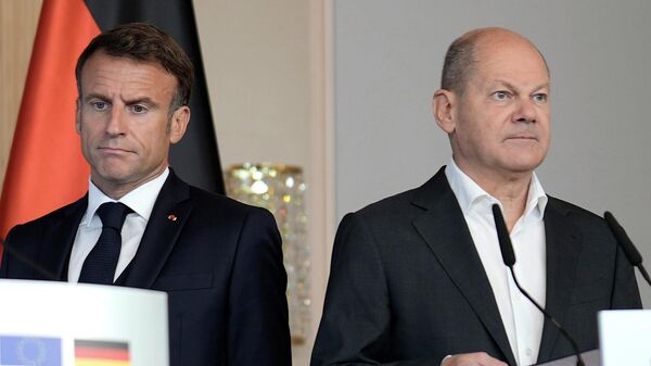 Канцлер Германии Олаф Шольц и президент Франции Эммануэль Макрон. Архивное фото - Sputnik Кыргызстан
