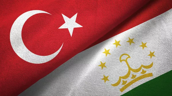 Флаги Таджикистана и Турции на текстиле. Иллюстративное фото - Sputnik Кыргызстан