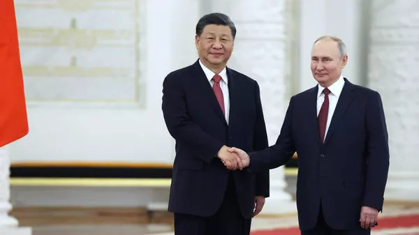 Встреча президента РФ В. Путина и председателя КНР Си Цзиньпина. Архивное фото  - Sputnik Кыргызстан