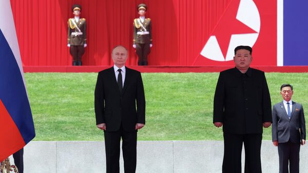 РФ лидери Владимир Путин жана Түндүк Корея лидери Ким Чен Ын - Sputnik Кыргызстан