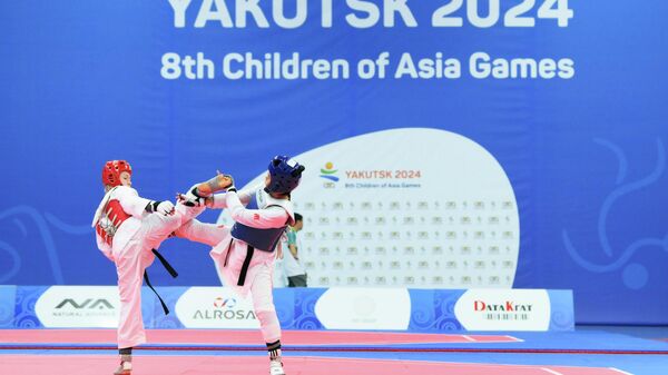 Соревнованиях по тхэквондо среди женщин на международных спортивных играх Дети Азии в Якутске. - Sputnik Кыргызстан