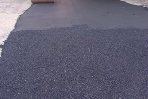 Жол курууда жасалма битумду колдонуу бюджетке зыян келтирип, жолдун үстүн бузууга жана коопсуздук эрежелерин сактабоого алып келет - Sputnik Кыргызстан