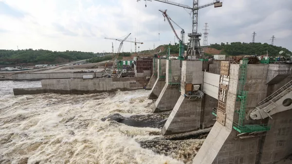 Строительство гидроэлектростанции. Архивное фото - Sputnik Кыргызстан