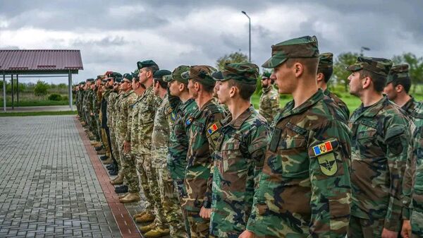 Молдавские военные во время учений JCET-2024 в Молдове. Архивное фото - Sputnik Кыргызстан