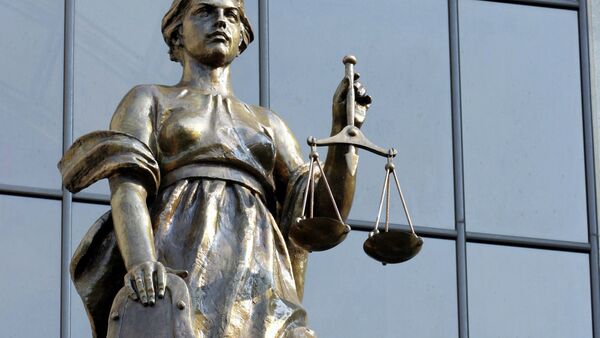 Статуя древнегреческой богини правосудия Фемиды на фасаде здания. Архивное фото - Sputnik Кыргызстан