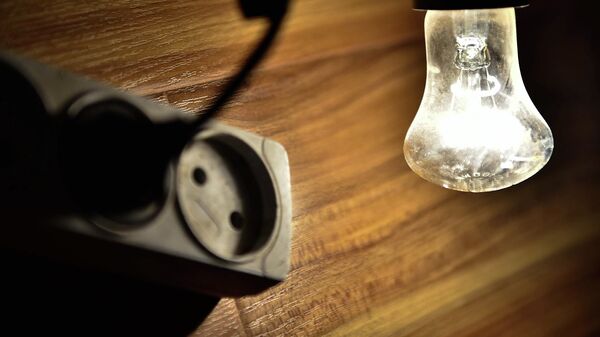 Лампочка с розеткой. Архивное фото - Sputnik Кыргызстан