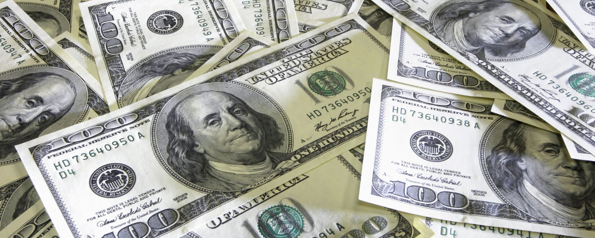 Доллары. Иллюстративное фото - Sputnik Кыргызстан, 1920, 22.03.2026