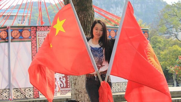 Кыргызский и китайский флаги. Архивное фото - Sputnik Кыргызстан