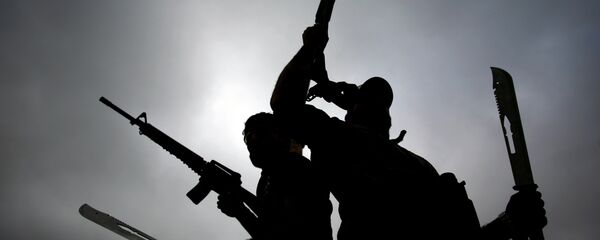 Боевики с оружием. Архивное фото - Sputnik Кыргызстан