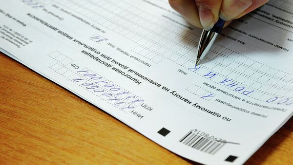 Заполнение налоговой декларации. Архивное фото - Sputnik Кыргызстан