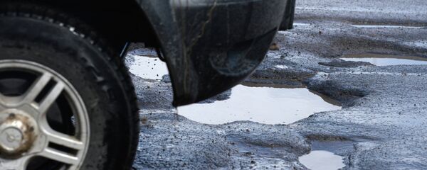 Разбитые дороги в Великом Новгороде - Sputnik Кыргызстан