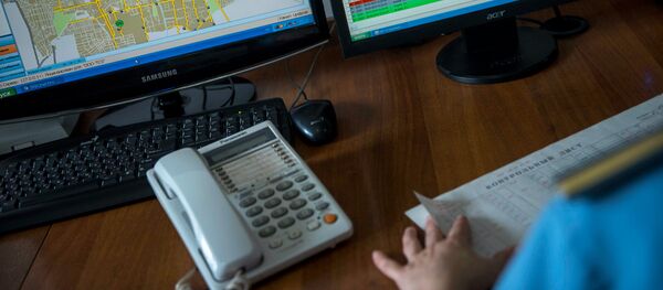 Работа за компьютером дежурного ДПС. Архивное фото - Sputnik Кыргызстан