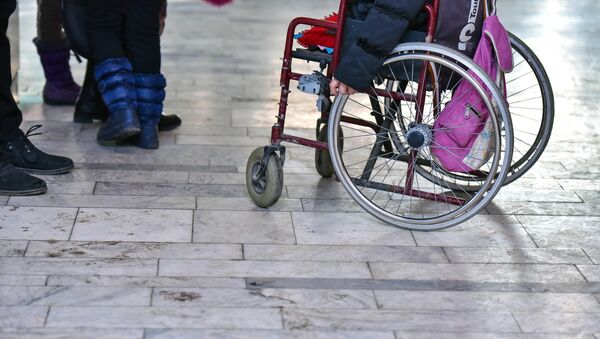 Мальчик на инвалидной коляске. Архивное фото - Sputnik Кыргызстан