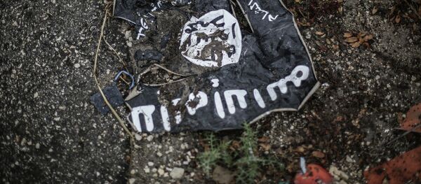 Флаг радикальной исламистской организации Исламское государство Ирака и Леванта - Sputnik Кыргызстан