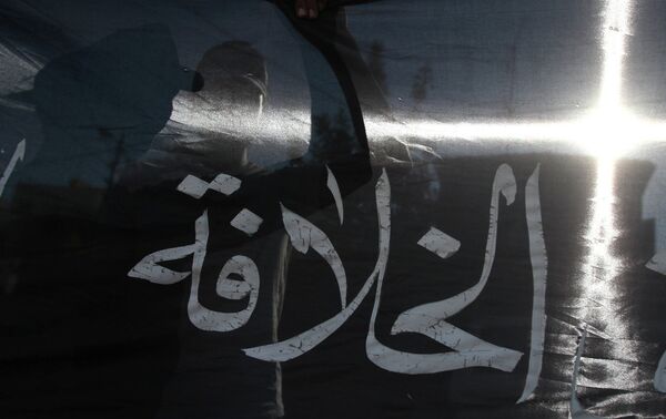 Черно-белый флаг Хизб ут-Тахрира. Архивное фото - Sputnik Кыргызстан