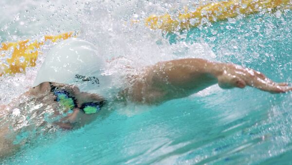 Пловец во время соревнований. Архивное фото - Sputnik Кыргызстан