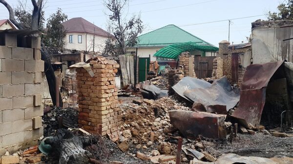 Дом Раисы Василенко сгоревший во время спецоперации по уничтожению террористов. Архивное фото - Sputnik Кыргызстан