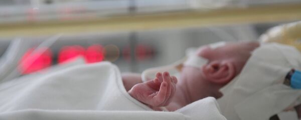 Новорожденный ребенок. Архивное фото - Sputnik Кыргызстан