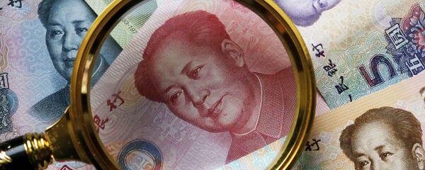 Китайские банкноты номиналом в 100, 50, 20,10 и 5 юаней. Архивное фото - Sputnik Кыргызстан