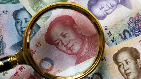 Китайские банкноты номиналом в 100, 50, 20,10 и 5 юаней. Архивное фото - Sputnik Кыргызстан