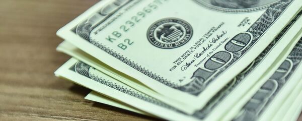Сто долларовые купюры США. Архивное фото - Sputnik Кыргызстан