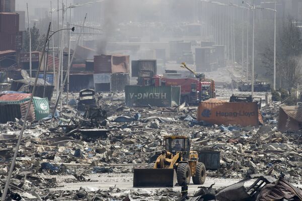 Последствия взрыва на складе в китайском городе Тянцзинь. Архивное фото - Sputnik Кыргызстан
