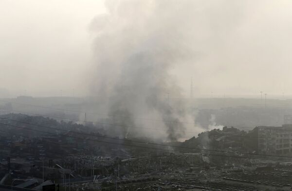 Последствия взрыва в  Тяньцзине, Китай. Архивное фото - Sputnik Кыргызстан
