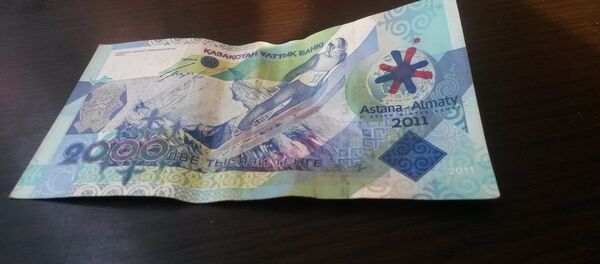 Казахский тенге. Архивное фото - Sputnik Кыргызстан