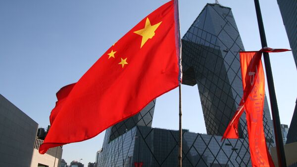 Государственный флаг Китая на улицах Пекина. Архивное фото - Sputnik Кыргызстан