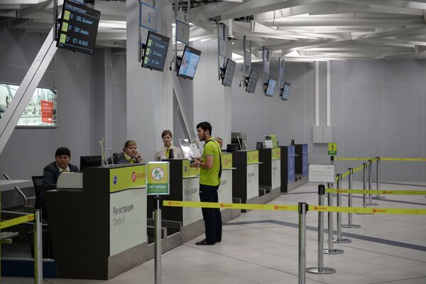 Стойки регистрации международных рейсов в аэропорту Новосибирска. Архивное фото - Sputnik Кыргызстан
