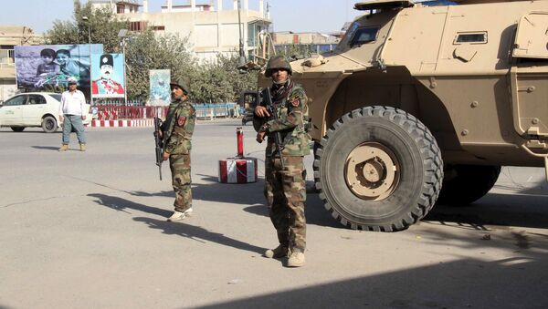 Афганские солдаты патрулируют улицы в городе Кундуз, Афганистан. Архивное фото - Sputnik Кыргызстан