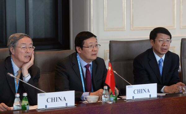 Глава Народного банка Китайской Народной Республики Чжоу Сяочуань (слева). Архивное фото - Sputnik Кыргызстан